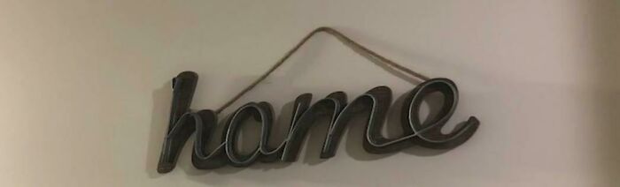 This Sign Is Supposed To Say "Home" But It Says" Hame" Instead
