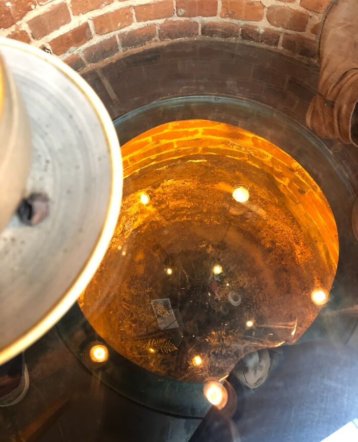 Our Table At The Local Cafe Is Positioned Over A Medieval Well