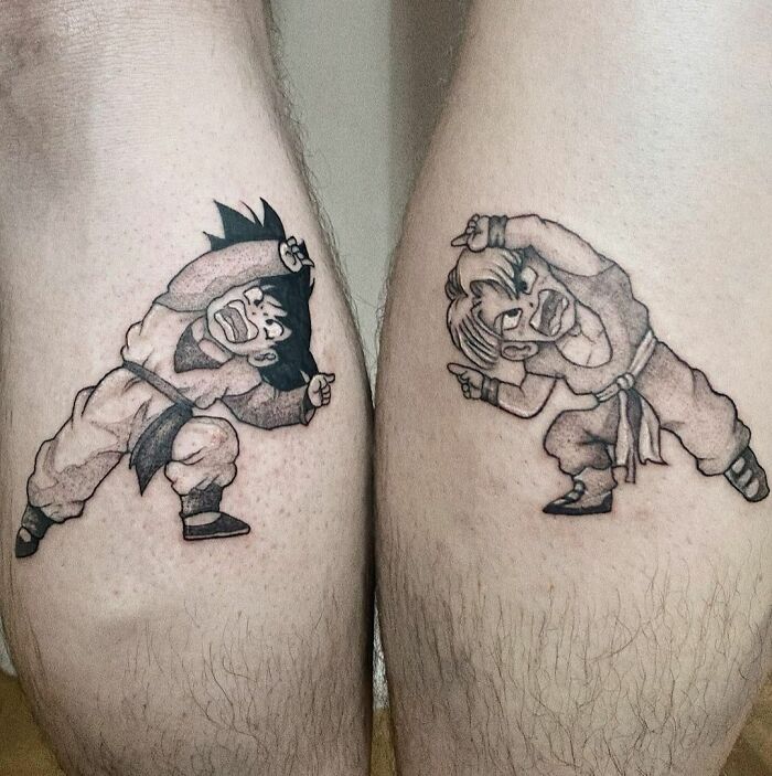 Anime-inspired BFF tattoos on legs, showing characters in action poses, symbolizing friendship and unity.