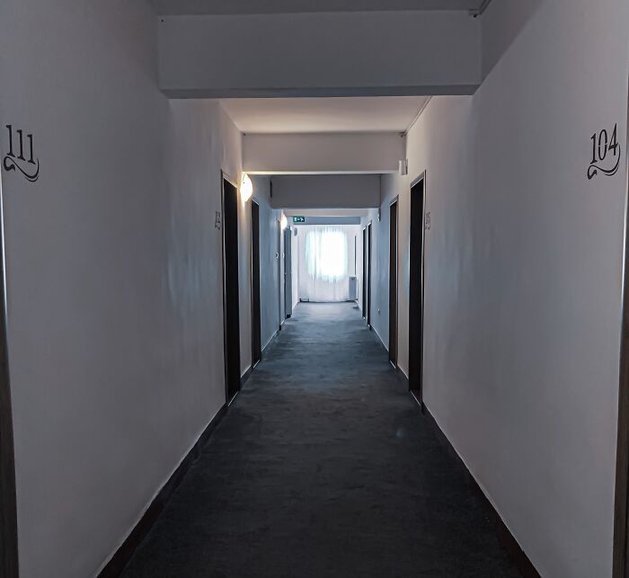 White Hotel Hall With A Window In Front 