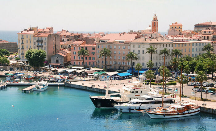 Coast with boats and houses in Corsica
