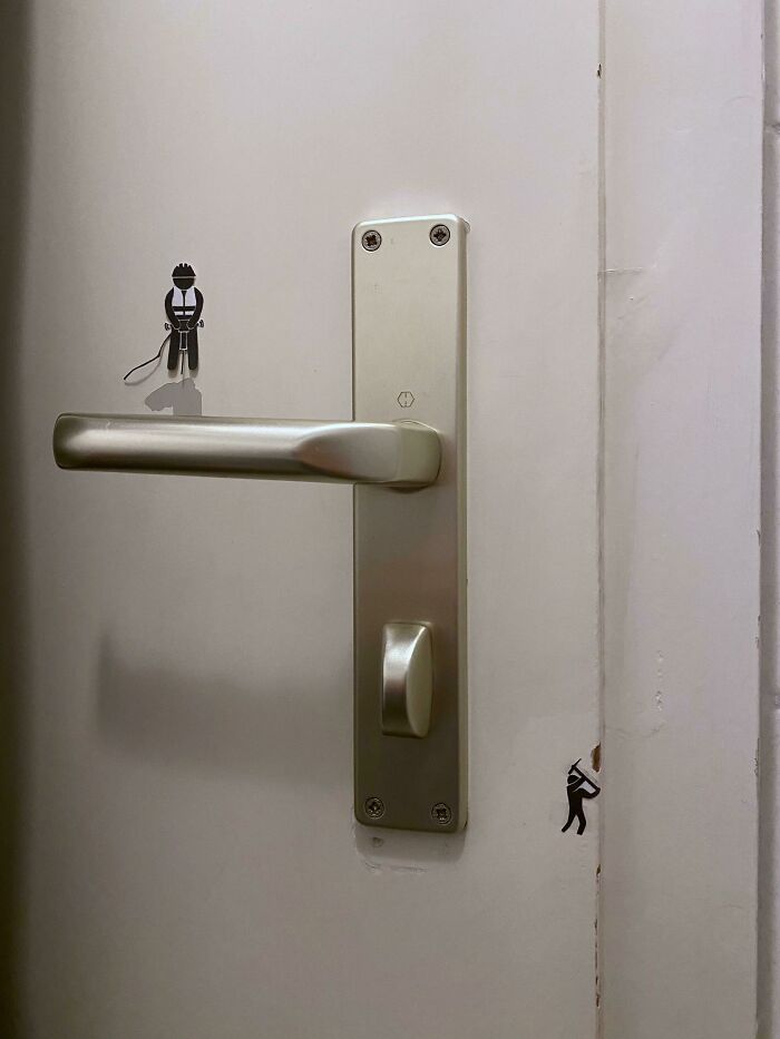 Little Workers On Damaged Door