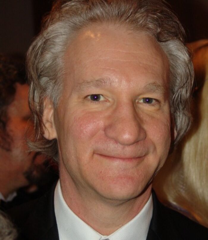 Bill Maher wearing a black suit at an event, one of the celebrities who never married yet still found love