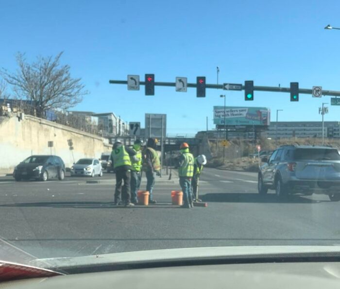 Digging Holes In The Middle Of A Major Intersection With No Signage Or Warnings, Seems Safe