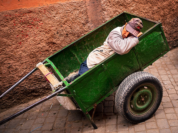Man taking a nap in a kart
