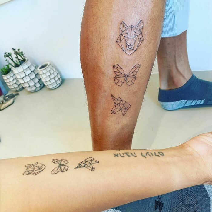 Geometric animal tattoos on arm and leg, showcasing unique celebrity tattoo inspiration in minimalist style.