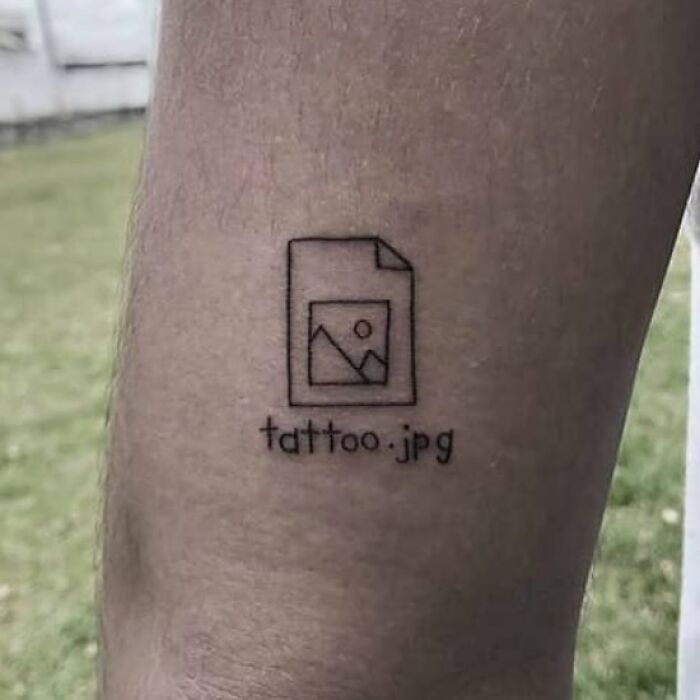 Tattoo of a digital image icon with the text "tattoo.jpg," representing a poorly thought-out tattoo decision.