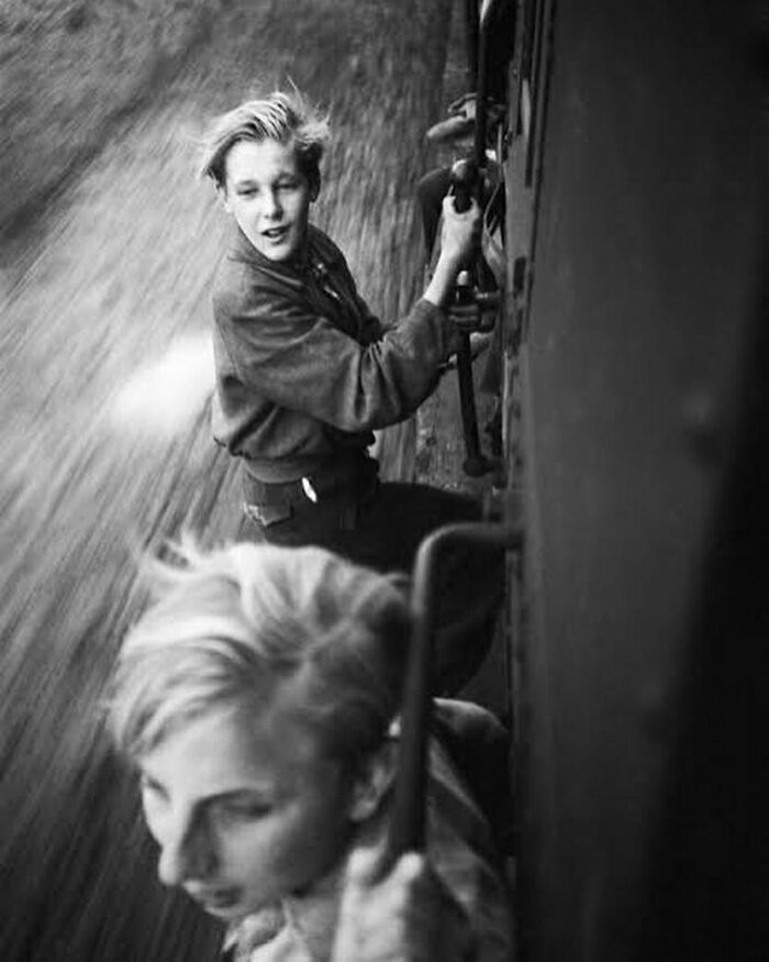 1945. Boys Hanging On A Full Train After The Liberation Of Holland. Photography By Menno Huizinga