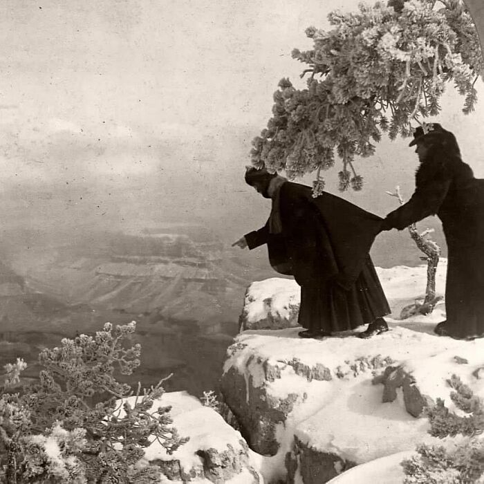 Tourists Peer Over A Cliff Into The Grand Canyon, Circa 1880