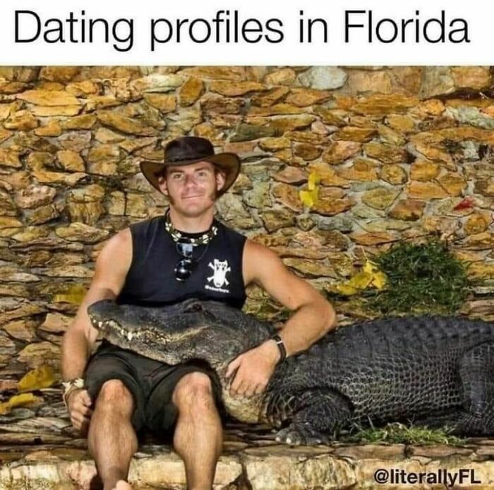 A man in a cowboy hat poses with an alligator, humorously representing Florida dating profiles.
