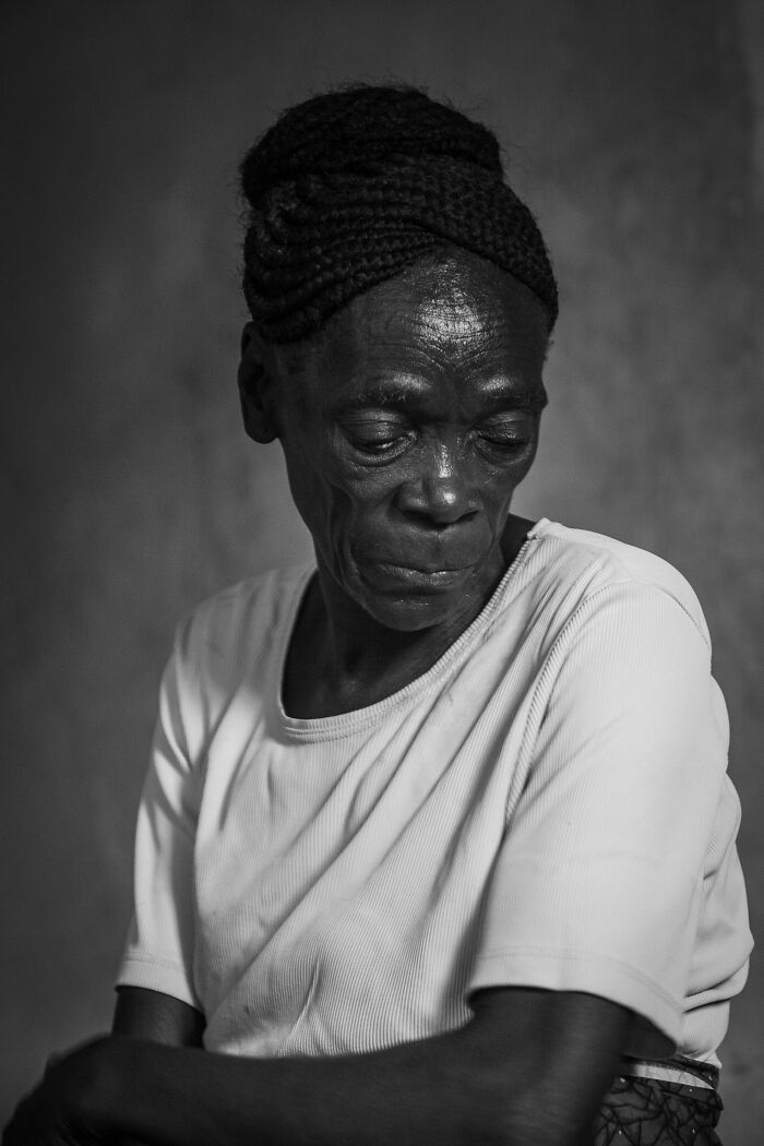 Black and white portrait of a woman, highlighting strength and emotion in honor of women breaking stereotypes.