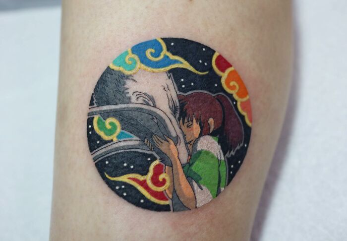 Mesmerizing tattoo by Korean artist featuring an anime scene, with vibrant colors and detailed design on skin.