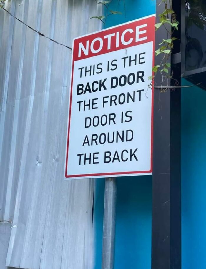 Notice sign explaining confusing door directions, an example of hilariously absurd signs shared in a Facebook group.