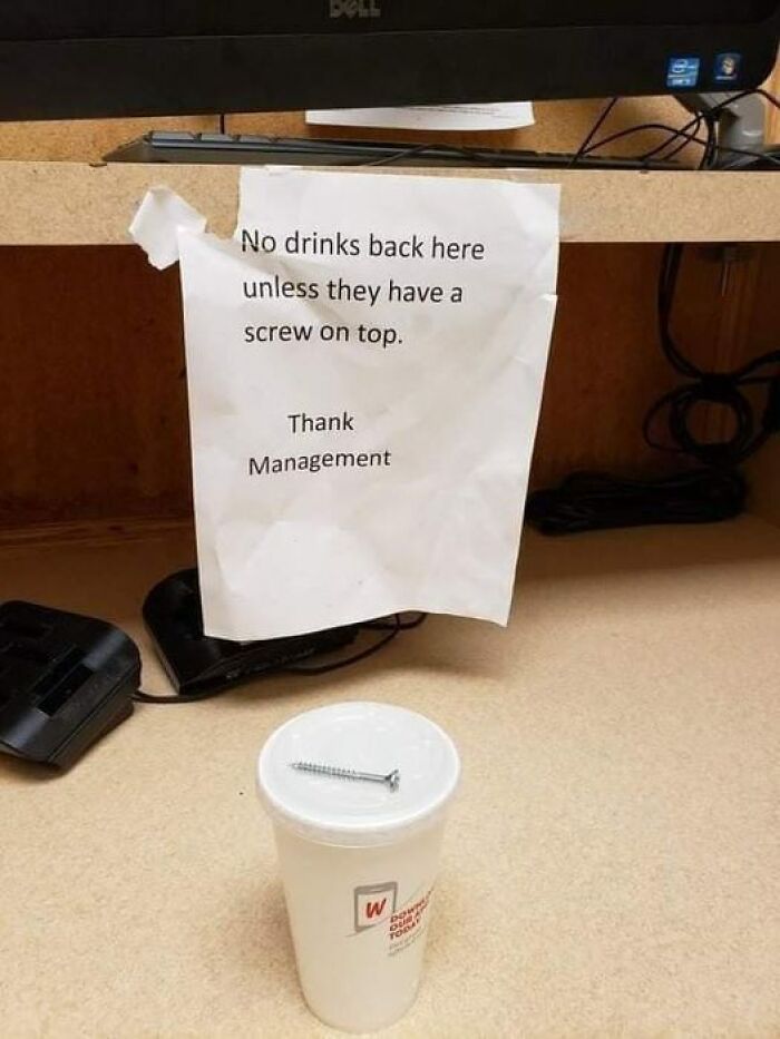 Funny and absurd sign warning about drinks only allowed if they have a s***w-on top, shared in a Facebook group.