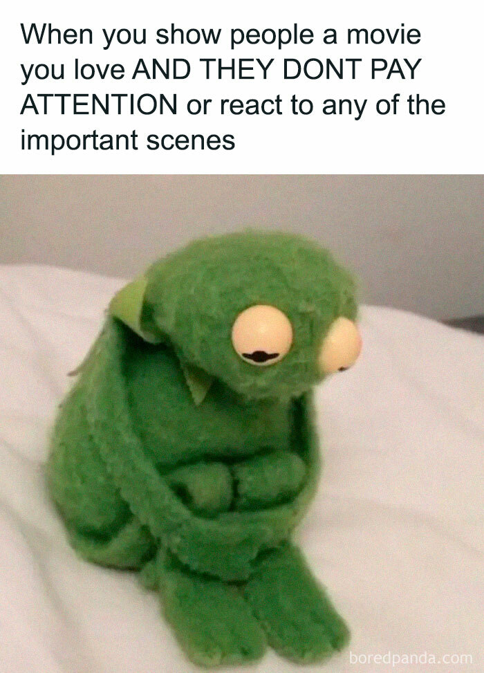 Sad Kermit the Frog sitting curled up on a bed showing emotion relevant to introvert memes to send friends.