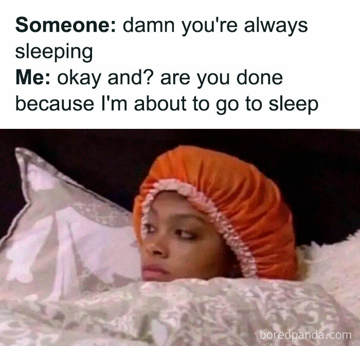 Person in bed wearing orange bonnet looking tired, relatable meme to send introvert friends about always sleeping.