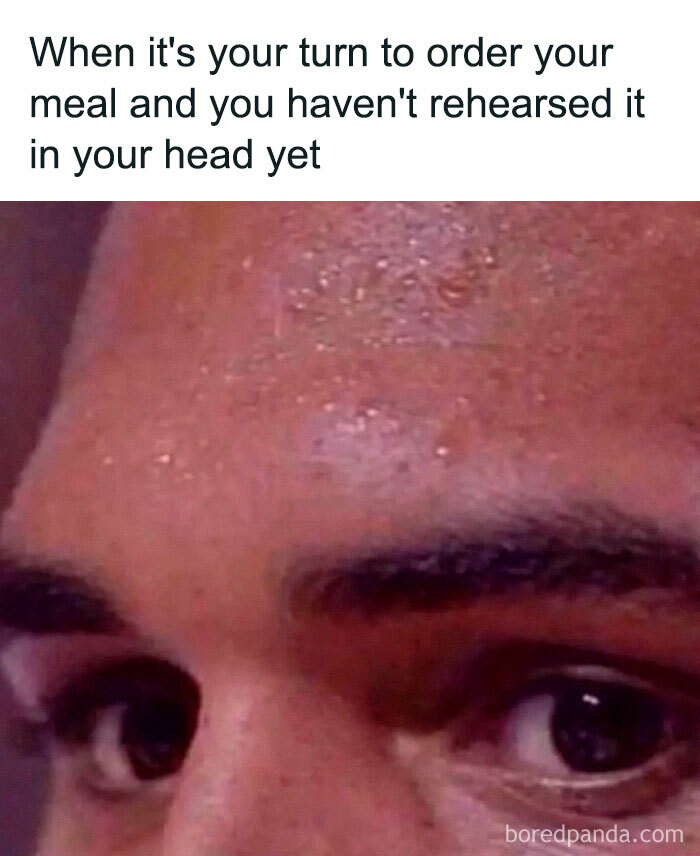 Close-up of a nervous face meme illustrating introvert friends hesitating to order a meal without rehearsal.