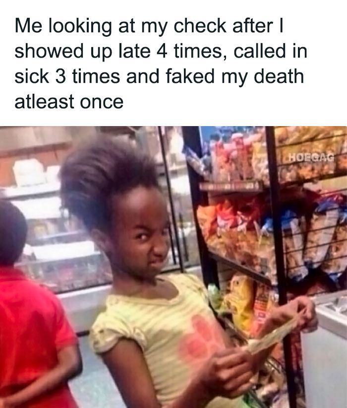 Person making a funny face in a store, holding cash, capturing an "I hate my job" meme.