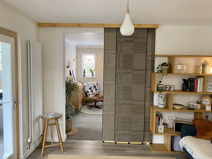 Created A Room Divide Using Vidga Panel Curtain System. Added Wooden Plinth To Hide The Rail And Upgraded The Plastic Base Rails With 61cm Visback Poster Hangers