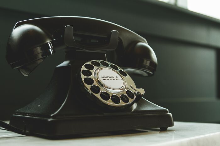 Black Landline Phone On The Table 