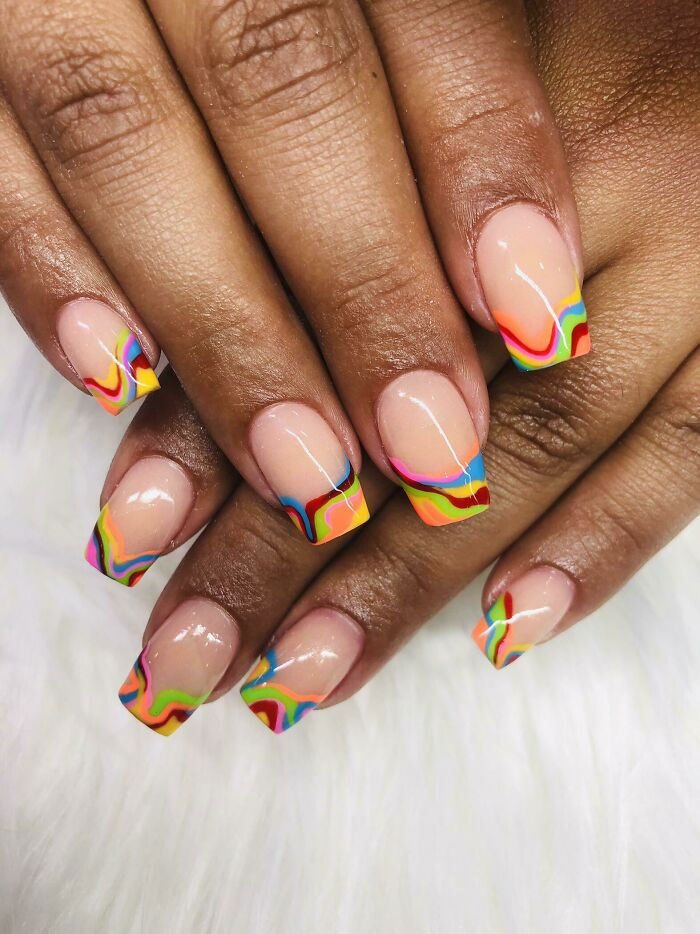 Colorful abstract nail art ideas on square-shaped nails with a glossy finish, showcasing creative nail art designs.