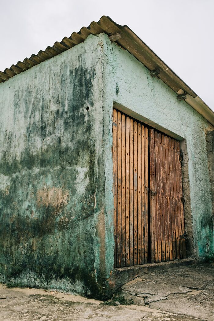 Old House With Old Garage Doors 