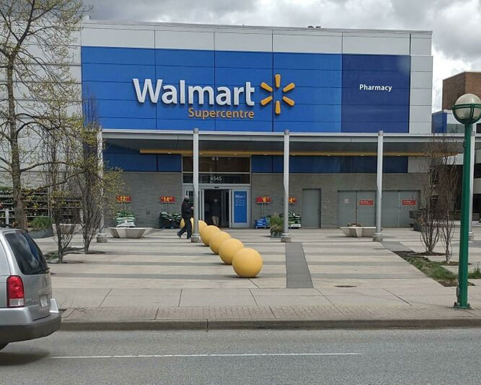 Former Target Turned Into A Walmart, They Painted The Target Orbs Yellow Instead Of Removing Them