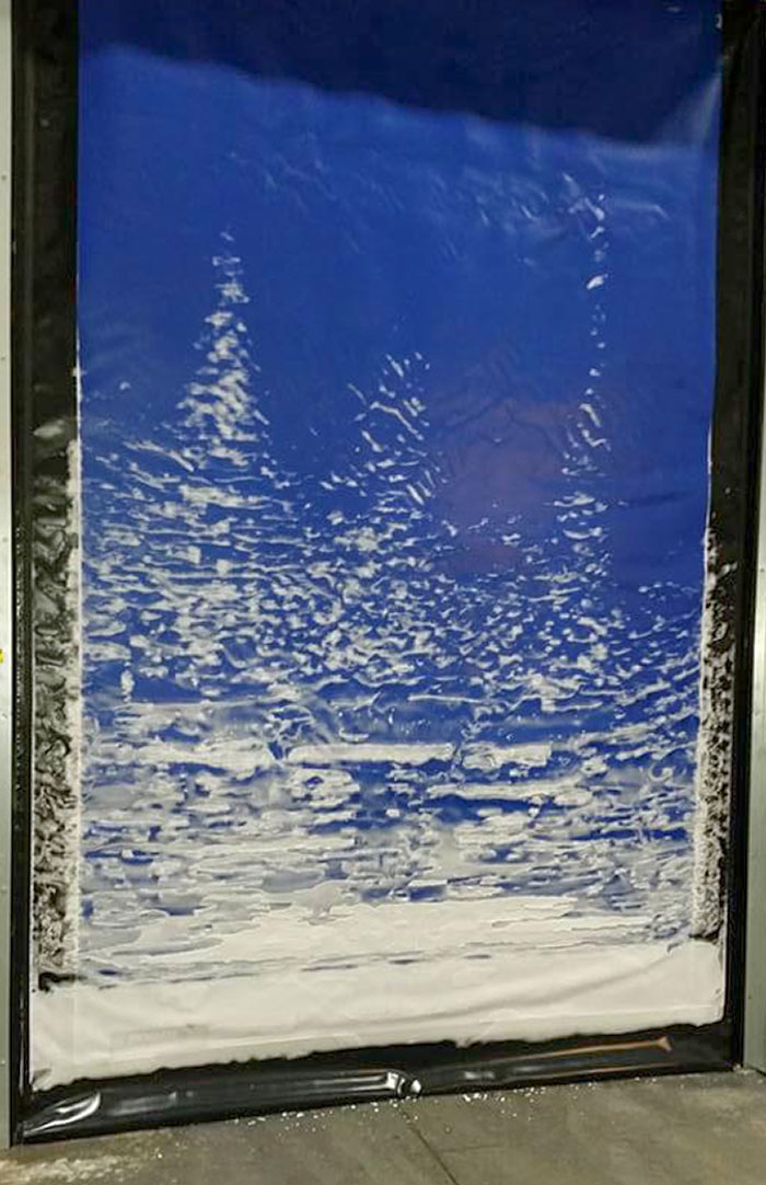 The Frost On This Roll-Up Door Looks Like A Bob Ross Painting