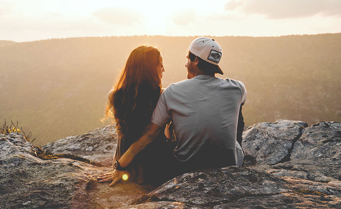 Couple sitting and looking at each other