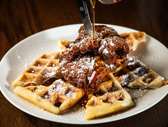 Picture of waffles with syrup and toppings