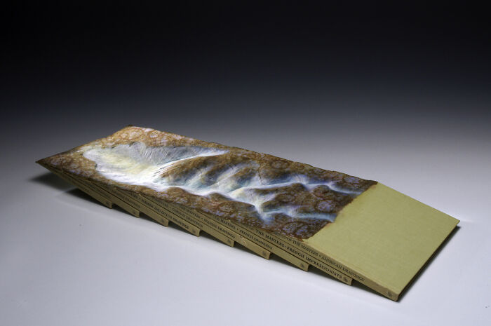 Carved Book Landscapes By Guy Laramee