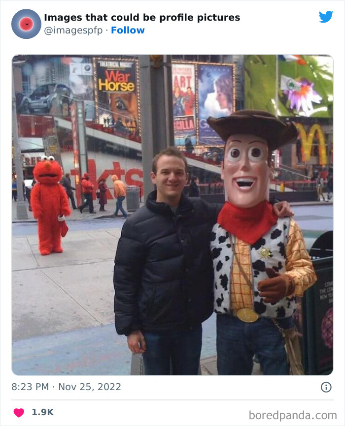 Man posing with Woody costume character while Elmo stands in the background in a funny image for profile pictures SEO.