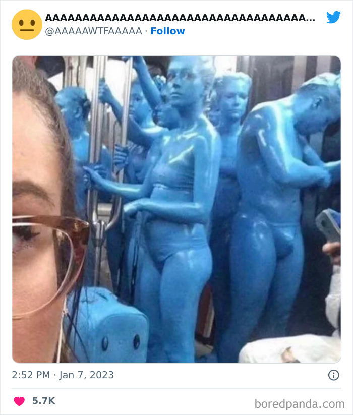 Passengers painted blue on a subway, an example of weird, funny internet pics.