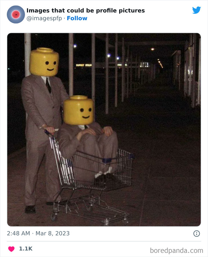 Two people in suits with large Lego heads, one pushing the other in a shopping cart at night, funny profile pictures.