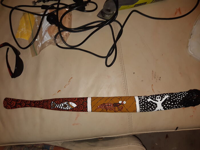 Woomera (Spear Thrower). Carved From A Piece Of Gum Tree Then Painted With Ochre, The Hook To Hold The Spear On Is Fixed With Grasstree Resin And Twine Made From Lomandra Grass. All Materials Came From The Bush