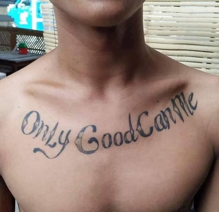 Chest tattoo reading "Only God Can Me" in black ink, representing a potential permanent mistake.