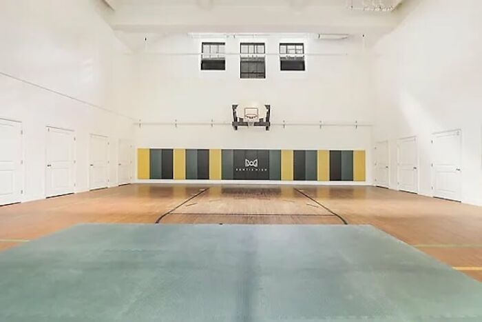 It Took 3 Years To Turn An Abandoned 1929 School Building Into This 31-Apartment Residential House