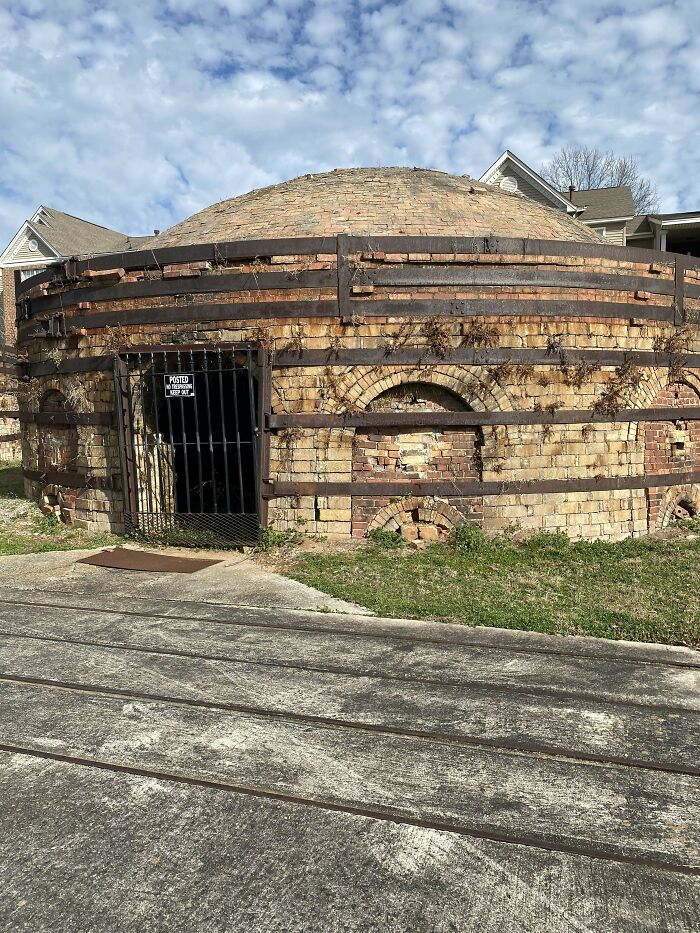 Strange Circular Huts, Made Of Brick And Metal