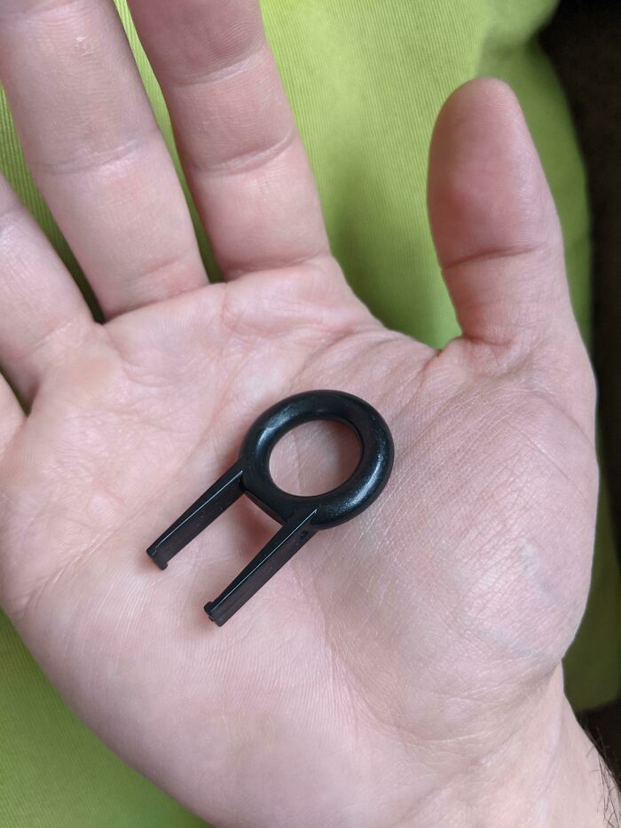 Plastic Trinket Found In A Corporate Swag Bag. Has A Hole Just Big Enough For A Fingertip, And Two Nubs Looking Like It Clips To Something