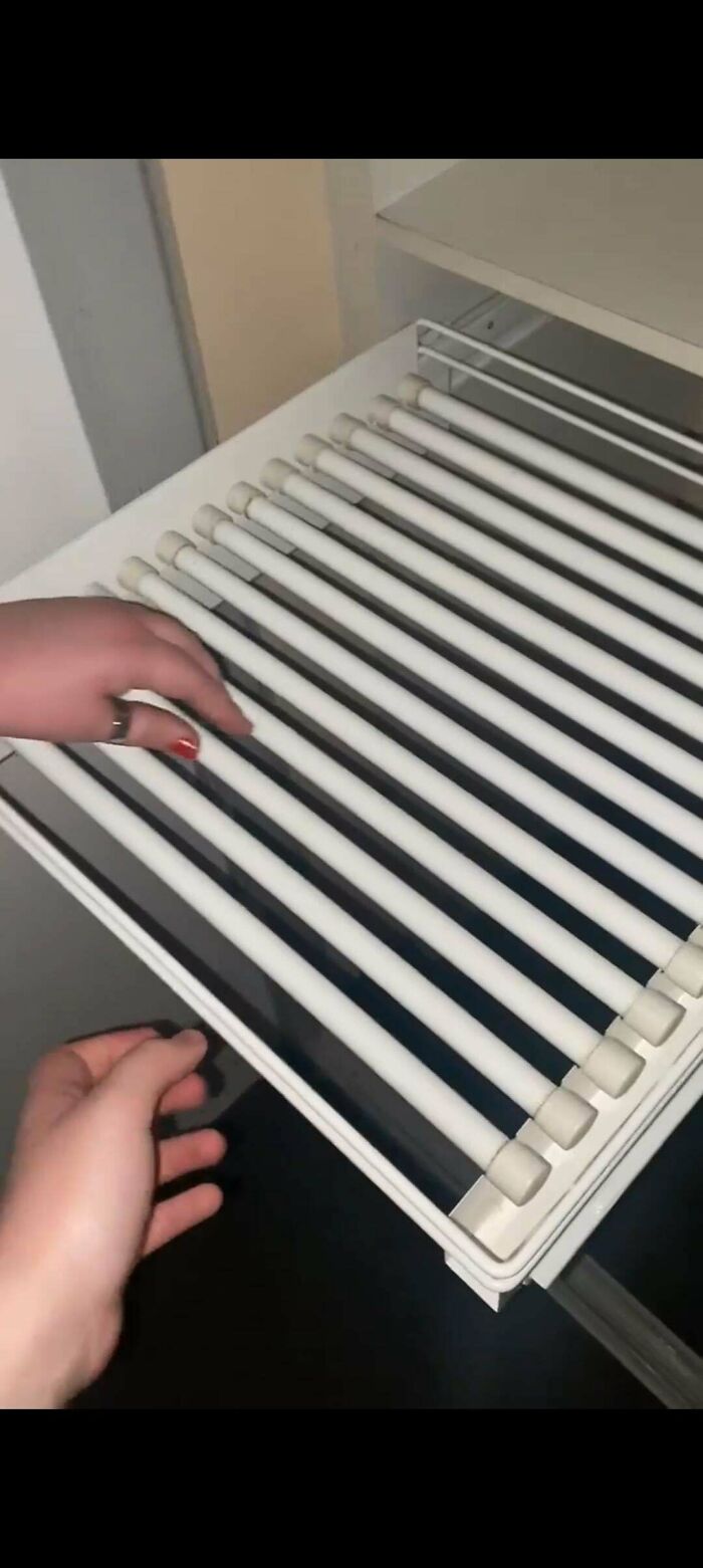 Found A Weird Rolling Shelf In My Wardrobe