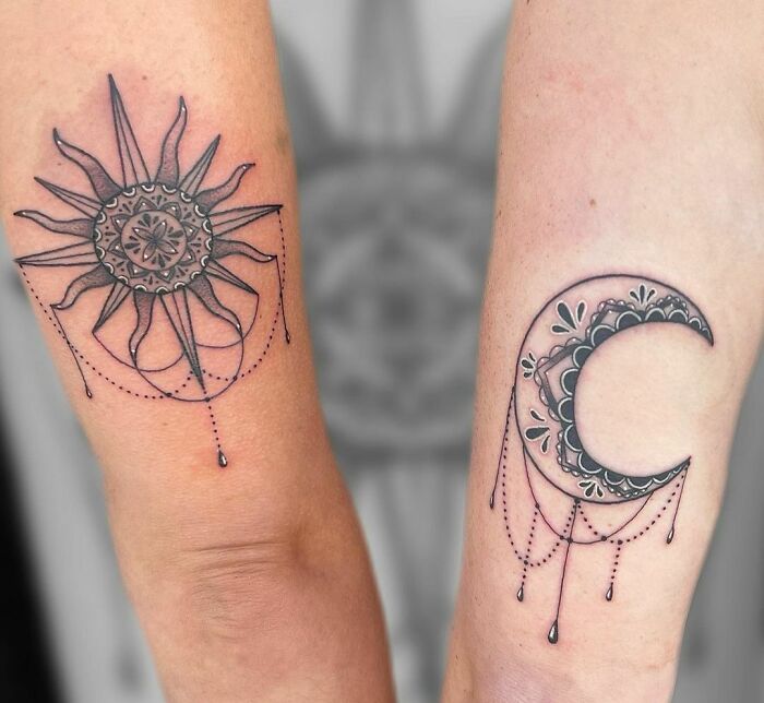 Sun and moon best friend tattoos on arms, symbolizing eternal friendship.