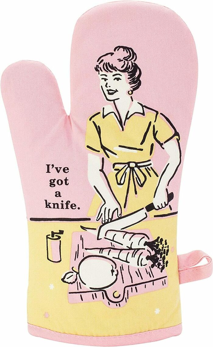 oven mitt with woman cutting a carrot 