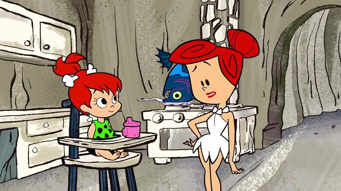 Wilma Flintstone and her kid Pebbles are at home