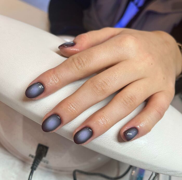 Gradient purple nail art design.