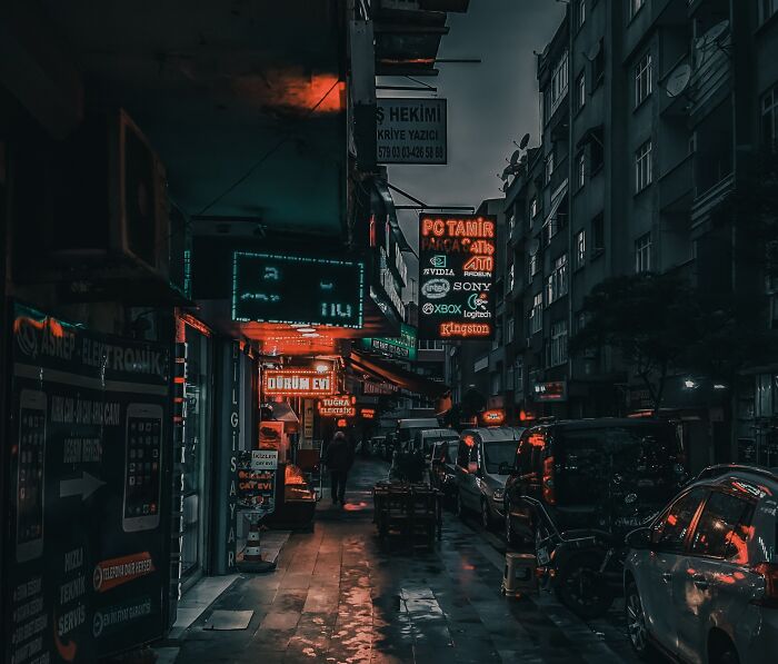 Dark Alley At Night With Couple Of LED Signs 