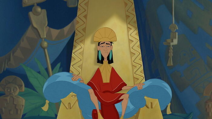 Kuzco sitting on the throne 