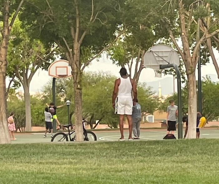 Giant GTA Man Watching A Chaotic Basketball Game?