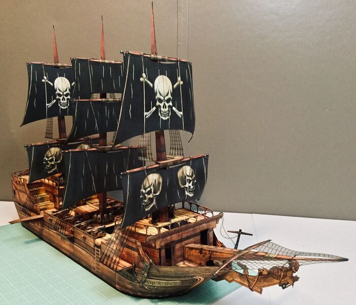 a paper pirate ship with sails