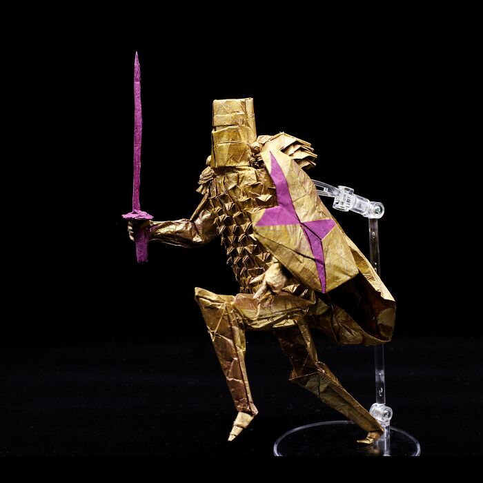 origami knight on a black background