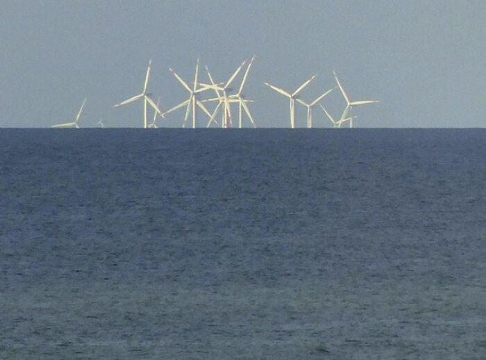 So Vast The Turbines Are Partway Below The Horizon